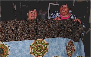 Suzi Stephens and Jenny Church with Quilt for Malawi